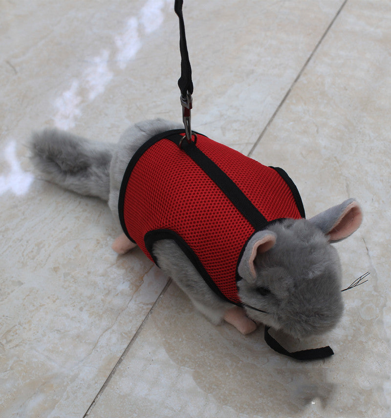 adjustable leash for small pets with a gray toy animal wearing a red harness on a tiled floor